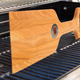 Don’t want to worry about broken-off bristles? This wooden grill scraper is meant to be used on a hot grill, and even has a built-in bottle opener.